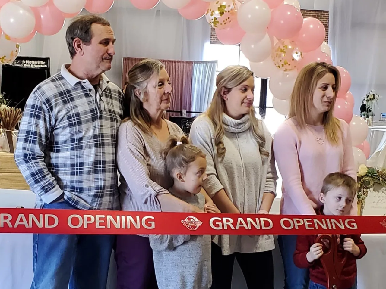 Ribbon Cutting Pink Balloons